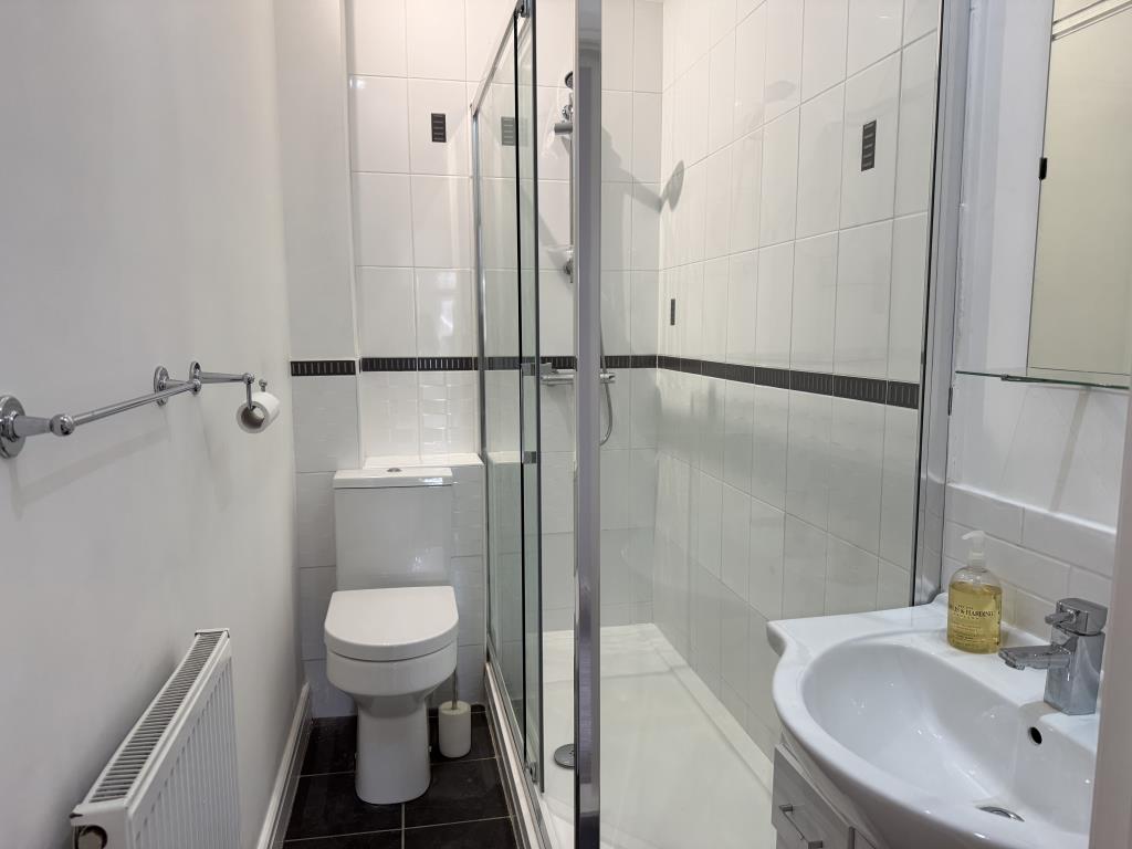 Lot: 53 - ONE-BEDROOM FLAT FOR INVESTMENT OR OCCUPATION - Shower room with white suite